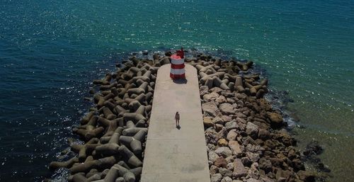 High angle view of groyne by sea