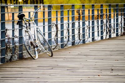 Footpath by railing in city