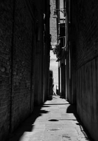 Narrow alley amidst buildings