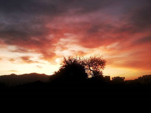 silhouette, sunset, sky, scenics, beauty in nature, tranquil scene, tranquility, tree, cloud - sky, nature, landscape, orange color, dramatic sky, idyllic, cloudy, cloud, mountain, moody sky, dusk, outdoors