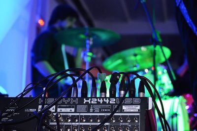 Defocused image of drummer at music concert