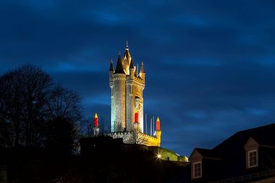 Low angle view of clock tower against sky