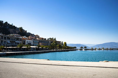 Scenic view of sea against clear blue sky, on a picturesque greek town