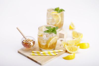 Close-up of drink against white background