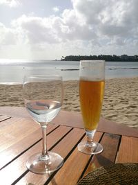 Close-up of wine glasses on table