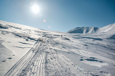 Snow covered mountain against sky