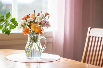 Potted plant on table at home