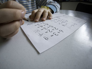 Close-up of solving mathematics