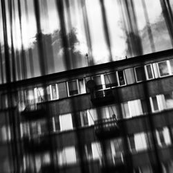 Reflection of window on glass table