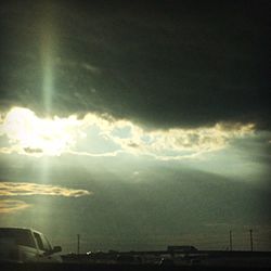 Scenic view of cloudy sky at sunset