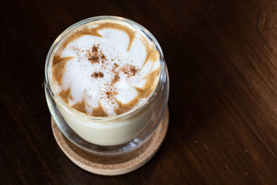 High angle view of cappuccino on table