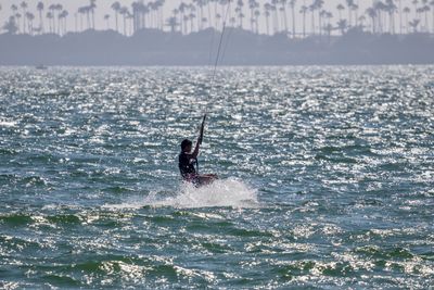 Man surfing in sea