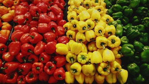 Full frame shot of bell peppers for sale in market