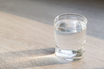 Close-up of water in glass on table