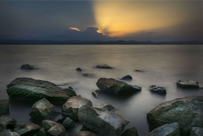 Scenic view of sea at sunset