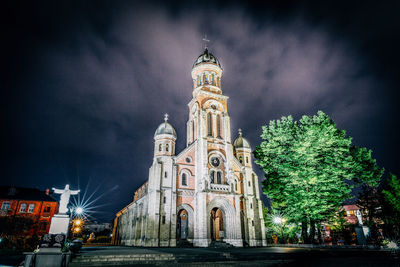 Low angle view of illuminated temple against sky at night