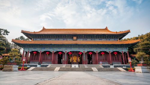 Exterior of temple building against sky