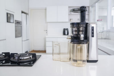 Juicer on kitchen counter at home