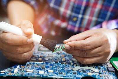 Close-up of hands working