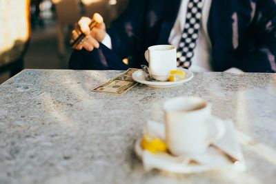 Close-up of coffee cup on table