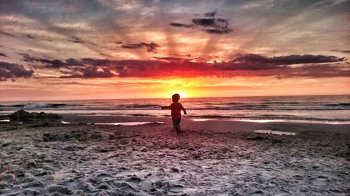 Scenic view of sea at sunset