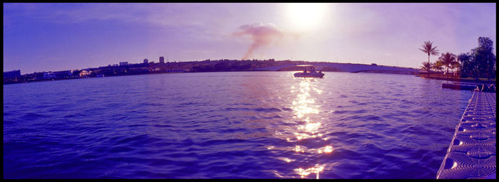 Panoramic view of sea against sky during sunset