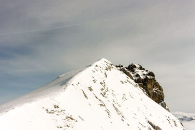 Scenic view of snowcapped mountain against sky