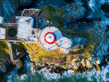 High angle view of rock formations in sea