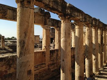 Monolithic doric columns of the public latrine along frontinus street, hierapolis-pamukkale, turkey. 