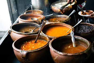 Variety assortment of local traditional guatemalan food served in big rustic clay pots