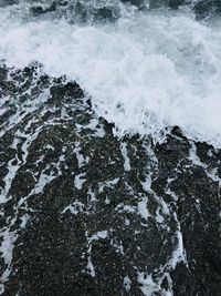 High angle view of rocks on beach