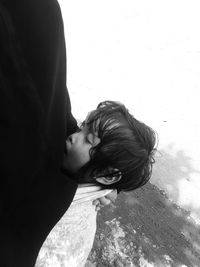 High angle view portrait of boy on shadow