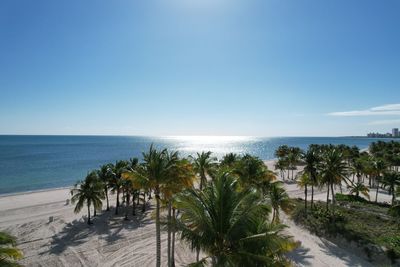 Scenic view of sea against clear blue sky