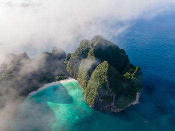 High angle view of rocks in sea