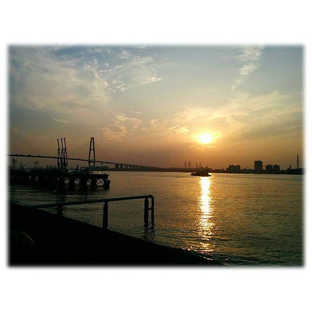 sunset, water, transfer print, sky, sea, auto post production filter, tranquil scene, scenics, tranquility, beauty in nature, silhouette, orange color, nature, cloud - sky, waterfront, reflection, sun, idyllic, pier, nautical vessel