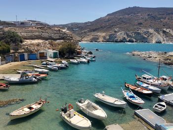 Boats moored at harbor