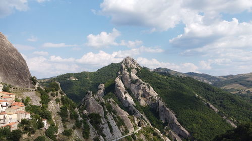 Scenic view of rocky mountains against sky