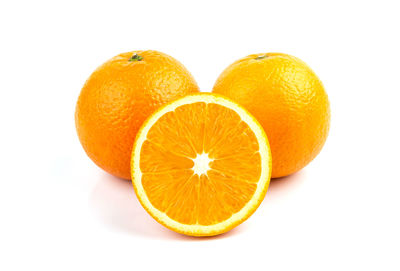 Close-up of orange against white background