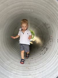 High angle view of boy playing with toys