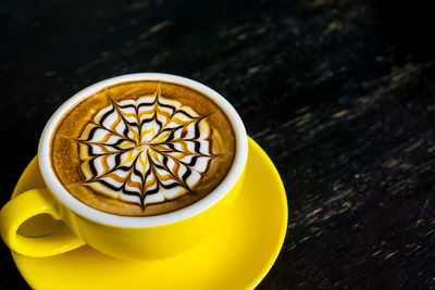 High angle view of coffee on table