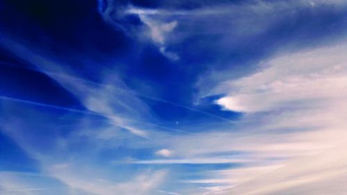 Low angle view of vapor trail in sky