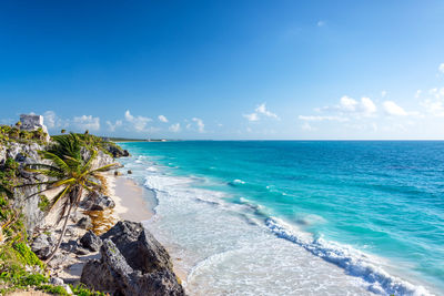 Scenic view of sea against blue sky