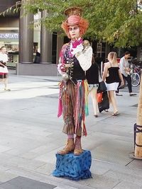 Portrait of woman standing outdoors