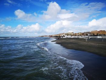 Scenic view of beach against sky