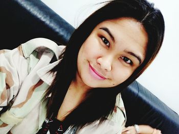 Portrait of smiling young woman