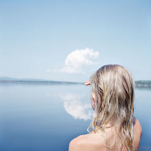 Girl looking at water