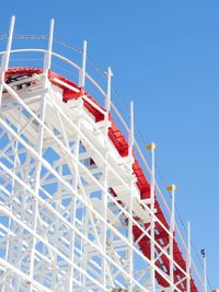 Low angle view of ship against clear blue sky