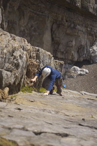 Full length of people on rock