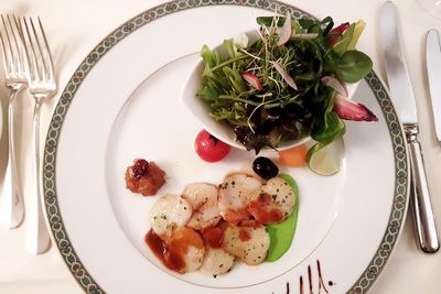 High angle view of salad in plate on table