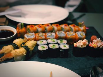 Close-up of sushi served on table